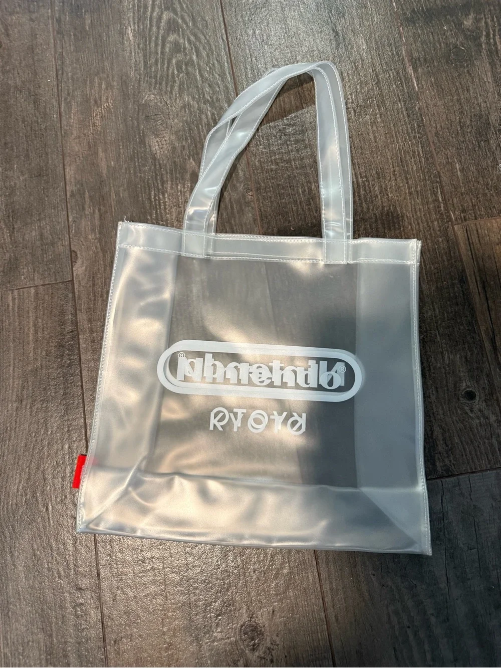 Nintendo Store Kyoto Japan. Clear White Transparent Tote Bag with Logo Accent